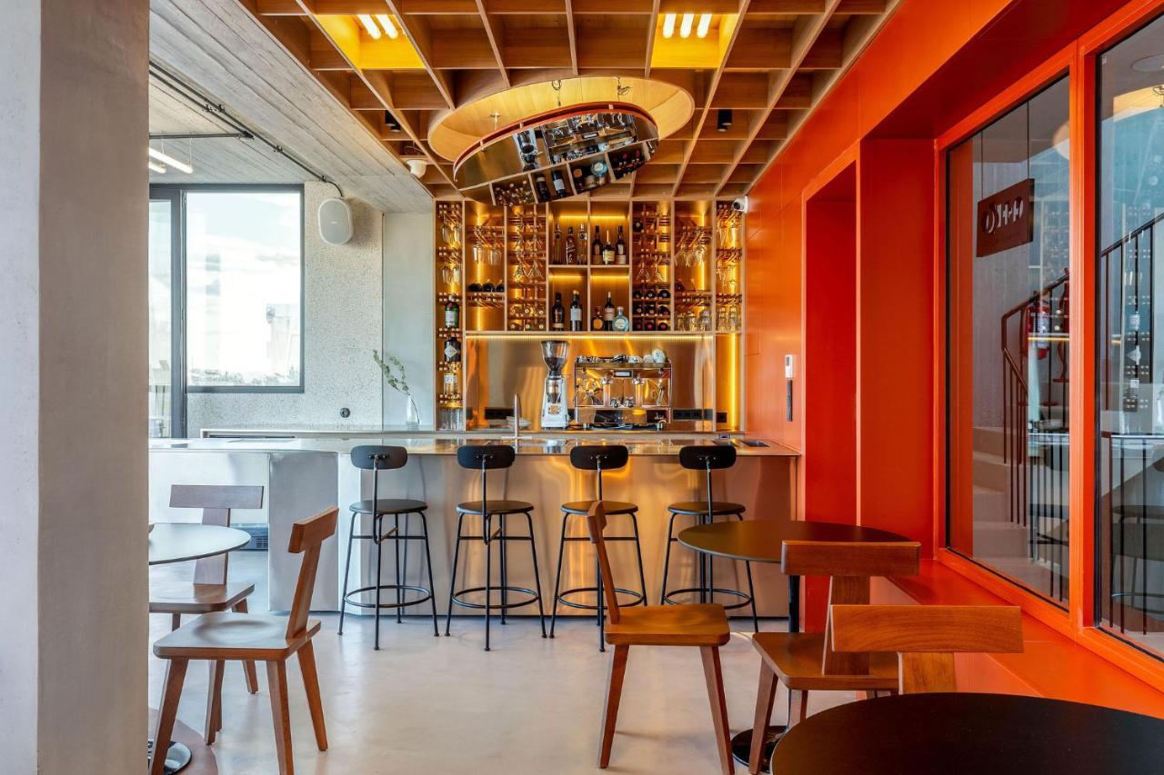 The Newel Psychiko Hotel Athens Exterior photo The interior of a Starbucks Reserve store in Milan, Italy