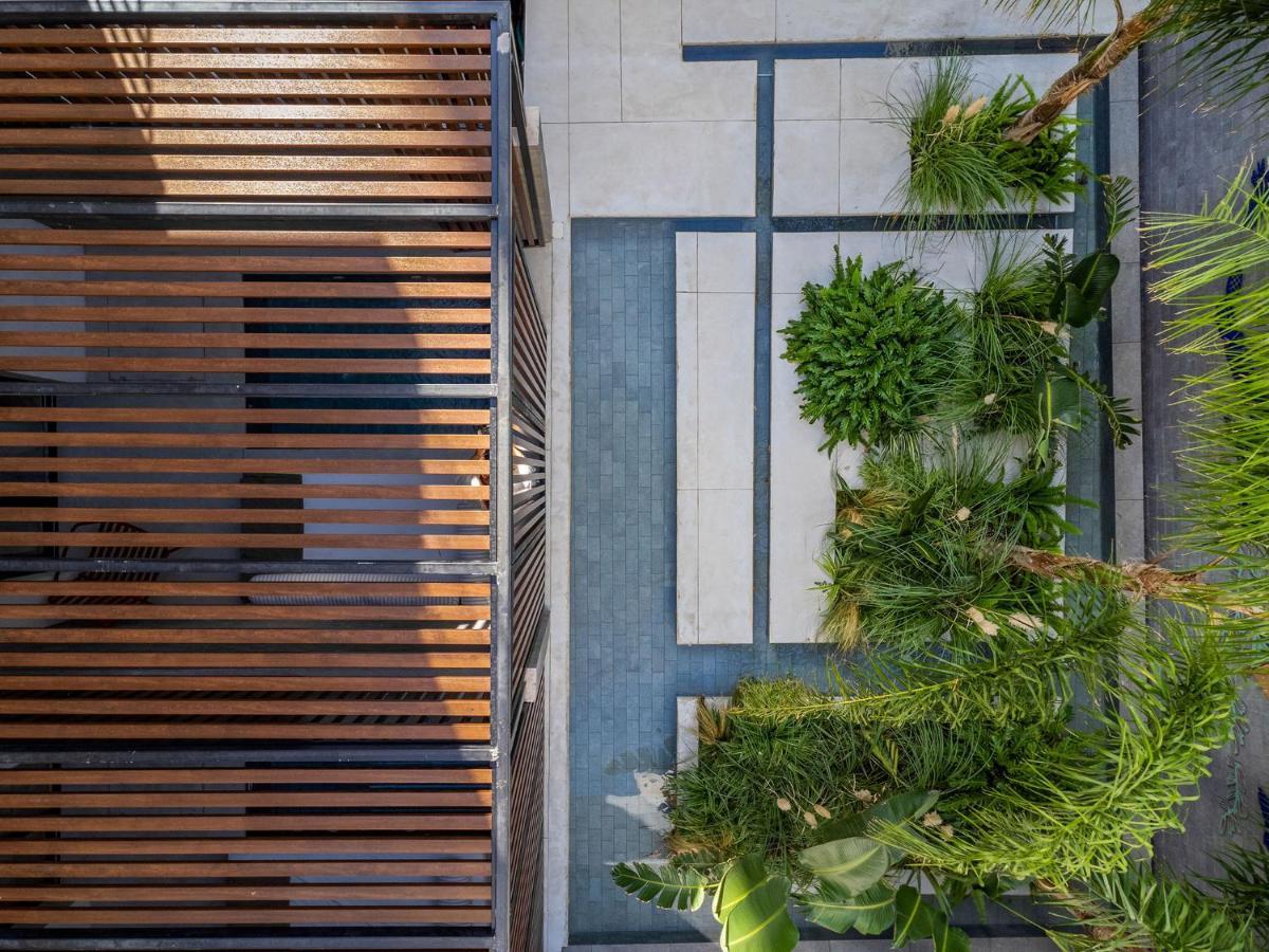 The Newel Psychiko Hotel Athens Exterior photo The courtyard of the house