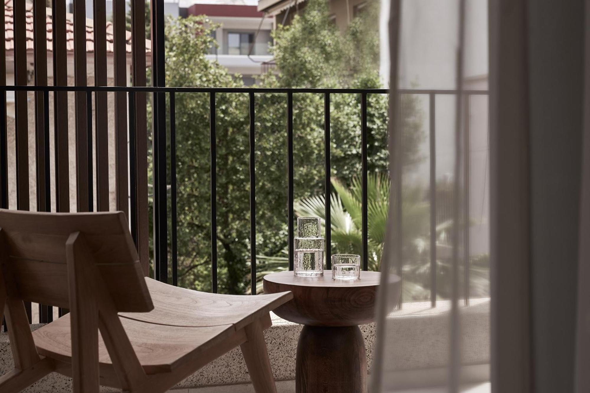 The Newel Psychiko Hotel Athens Exterior photo 3D rendering of a balcony